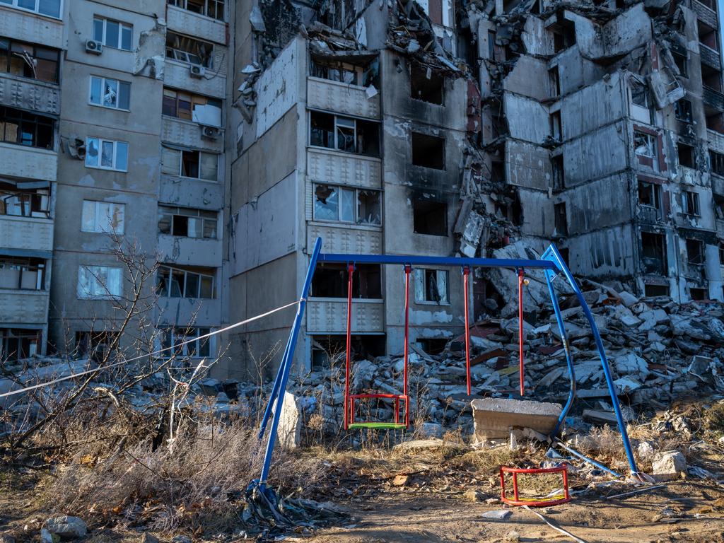 A swing set sits near a destroyed building in a section of Kharkiv that was heavily damaged by the Russians on January 24, 2023 in Kharkiv, Ukraine. (Photo by Spencer Platt/Getty Images) ***