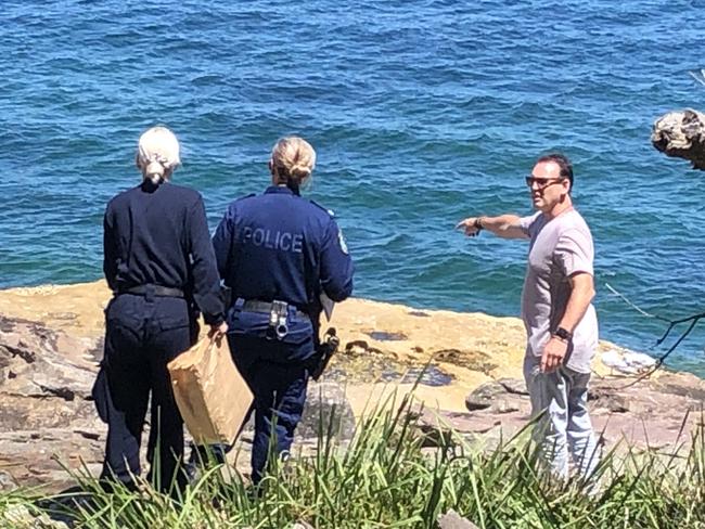 Police at the rock platform between  Dalwood and Fairlight beaches, where a 26-year-old North Narrabeen man was allegedly assaulted by four otherson Sunday afternoon. Picture: Jim O'Rourke