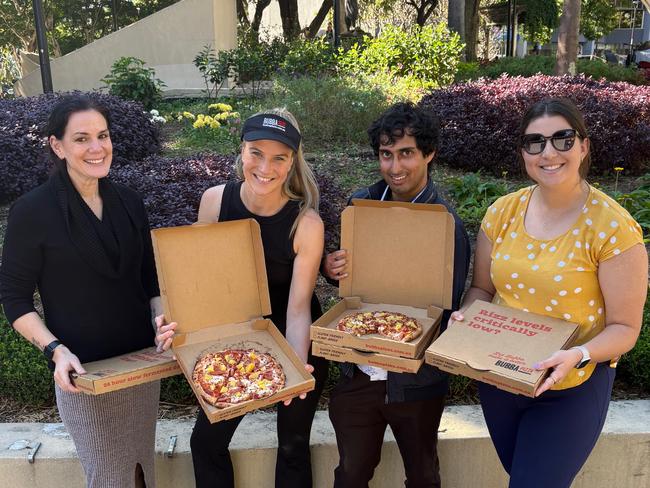 An esky full of ham and orange pizza has been handed over to a group of Brisbane friends after travelling onboard a flight from Melbourne. Picture: Supplied