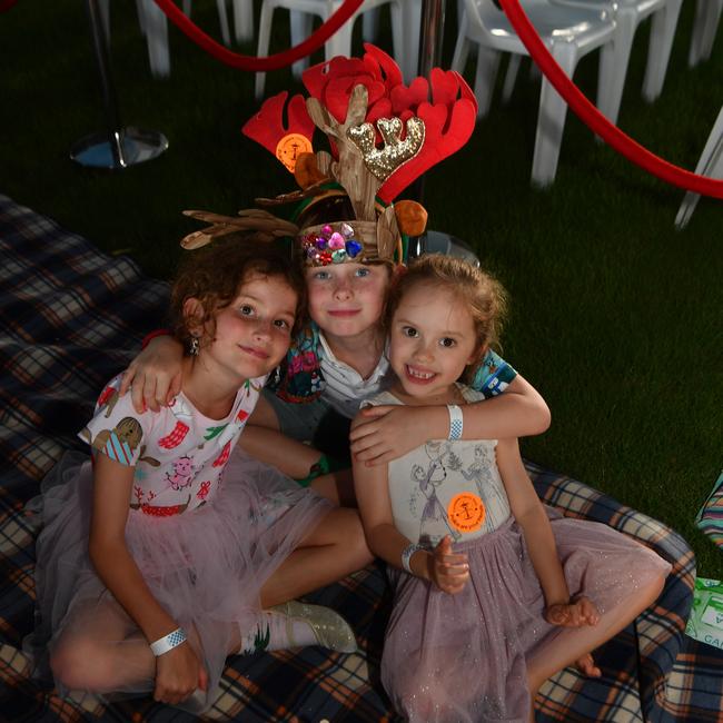 Carols by Candlelight at Riverway 2022. Ivy, 8, and Floyd Gibbs, 7, with Ferne O'Brien, 6. Picture: Evan Morgan