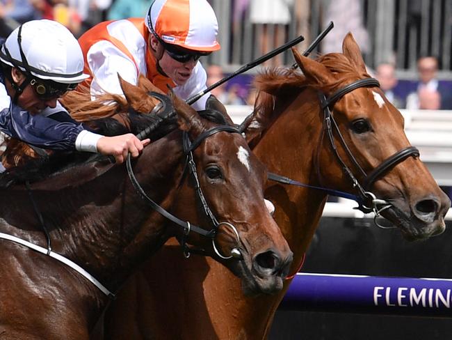 Jockey Craig Williams rides Vow And Declare to victory from Frankie Dettori riding Master Of Reality and Wayne Lordan riding Il Paradiso in race 7, the Lexus Melbourne Cup,  during Melbourne Cup Day, at Flemington Racecourse in Melbourne, Tuesday, November 5, 2019. (AAP Image/Vince Caligiuri) NO ARCHIVING, EDITORIAL USE ONLY