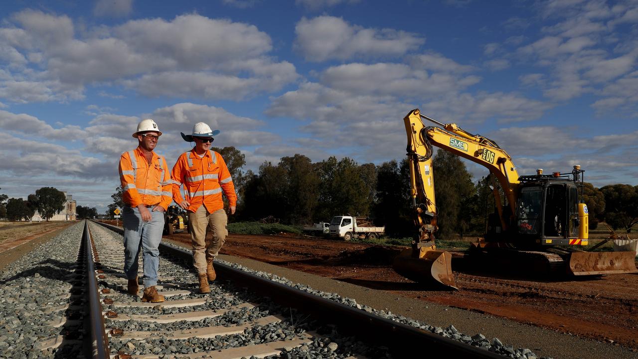 Parkes local Steve Magill, a civil earth works contractor, pictured with one of his excavator operators, Billy Payne, at an area of track 40 minutes outside of Parkes. Magill has benefited from the expansion of the inland rail around the Parkes district in NSW which has financially revived the area, Friday 19 June, 2020. Picture: Nikki Short