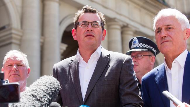 Victorian Premier Daniel Andrews and Prime Minister Malcolm Turnbull speak at the Bourke Street floral tribute after five people, including an infant, were killed on Friday. Picture: Paul Jeffers / Getty Images