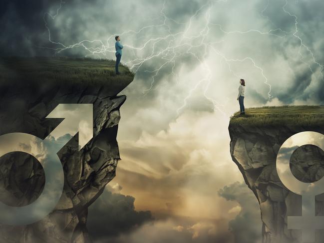 Gender gap idea and sex inequality concept as male and female sign shaped into stone cliff of different size as a metaphor of social issue distinct importance and discrimination in business. Transgender. Istock