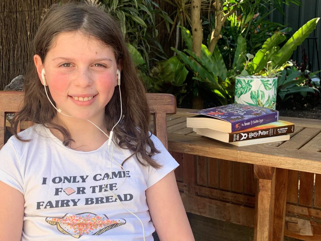 SMART Kids News Short Story Competition: audiobooks can rescue reluctant readers. Jeremy Cole's daughter Naava, 10, loves writing stories and says listening to audiobooks makes her feel calm and gives her ideas. Picture: supplied.