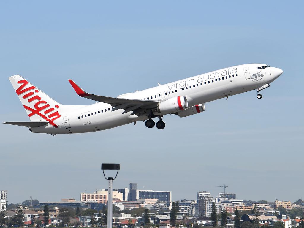 Virgin’s sale announcement coincides with Queensland opening its borders to interstate travellers. Picture: Saeed Khan/AFP