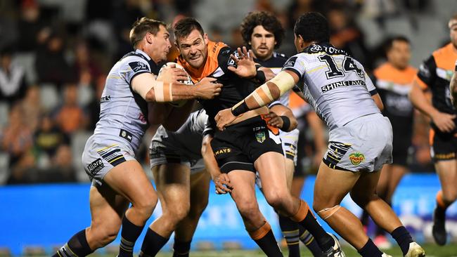 Tim Grant on the charge for Wests Tigers.