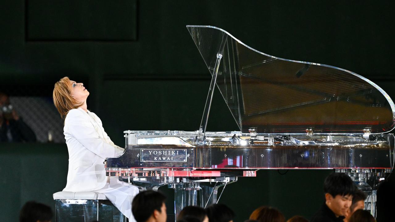 Yoshiki, the renowned composer, pianist, and leader of X Japan, continues to make significant cultural impacts in 2025 following a powerful comeback after neck surgery where he performed both national anthems at the MLB Opening Series in Tokyo. Picture: Getty