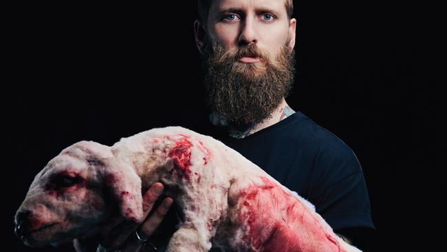 Under fire: Jona Weinhofen with the fake lamb in PETAs advertisement.