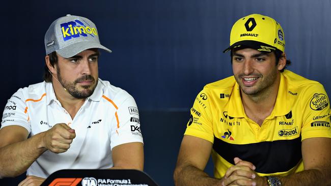Carlos Sainz to replace fellow Spanaird Fernando Alonso at McLaren Next Season - MONTMELO, SPAIN - MAY 10: Fernando Alonso of Spain and McLaren F1 with Carlos Sainz of Spain and Renault Sport F1 in the Drivers Press Conference during previews ahead of the Spanish Formula One Grand Prix at Circuit de Catalunya on May 10, 2018 in Montmelo, Spain. (Photo by David Ramos/Getty Images)