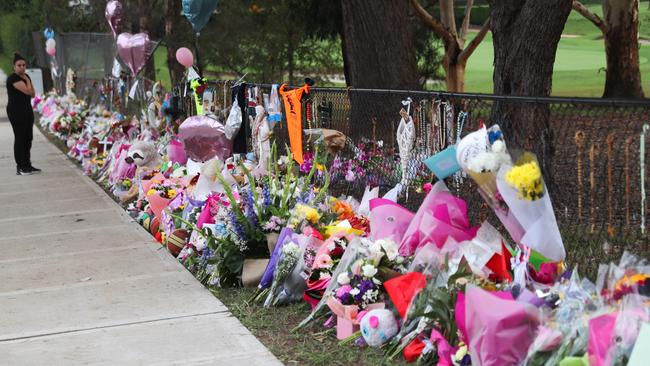 The memorial to the four children is growing daily on Bettington Rd in Oatlands. Picture: John Grainger