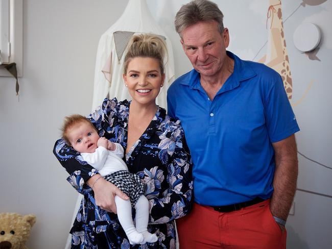 Rebecca Maddern and her daughter Ruby with Sam Newman.