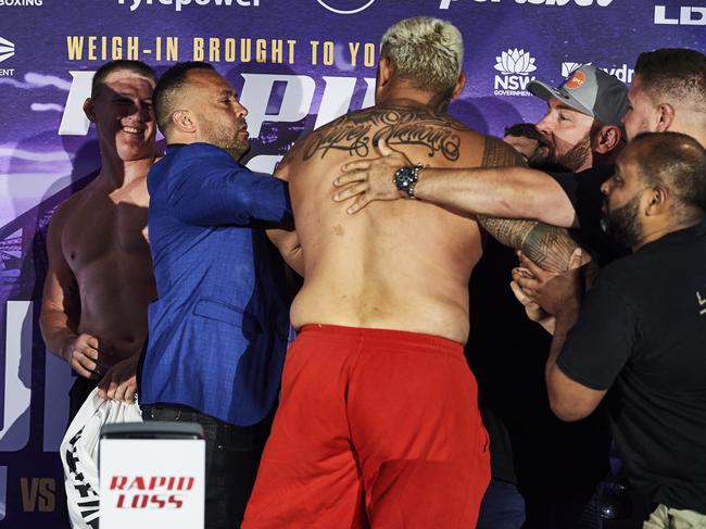 SYDNEY, AUSTRALIA - DECEMBER 15: Mark hunt schuffles with Paul Gallen on stage during the weigh in ahead of Sydney Super Fight, at Taronga Zoo on December 15, 2020 in Sydney, Australia. (Photo by Brett Hemmings/Getty Images)