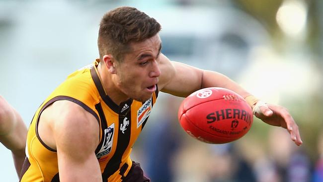 MELBOURNE, AUSTRALIA - SEPTEMBER 05: Shem Tatupu of the Hawks gathers the ball during the VFL Qualifying Final match between the Box Hill Hawks and Footscray Bulldogs at Box Hill City Oval on September 5, 2015 in Melbourne, Australia. (Photo by Robert Prezioso/AFL Media/Getty Images)