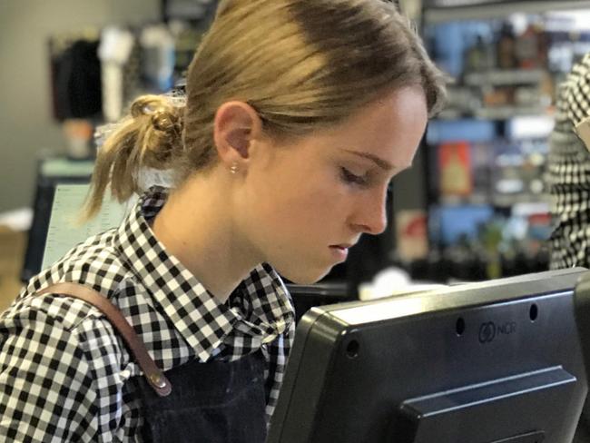 Young workers at the Go to Grocer in Prahran. They are sick of being abused about things they have no control over like pricing.