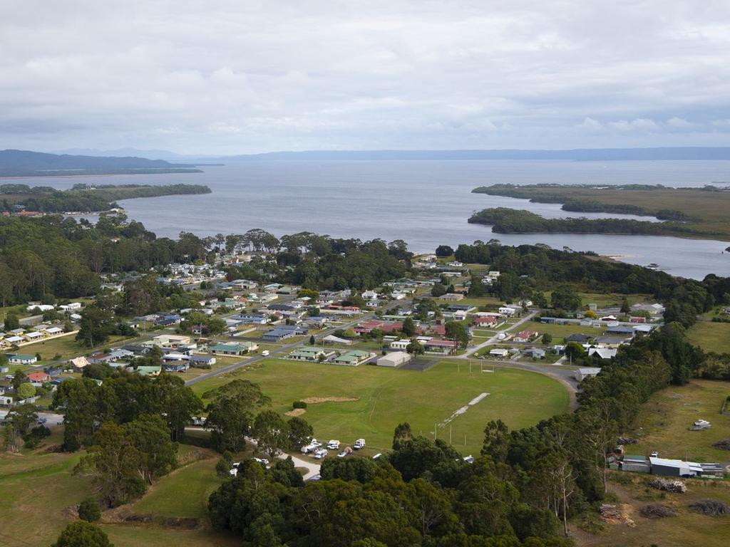 A majority of the residents living in picturesque Strahan - in Tasmania - rely on the salmon industry to survive. Picture: West Coast Tas