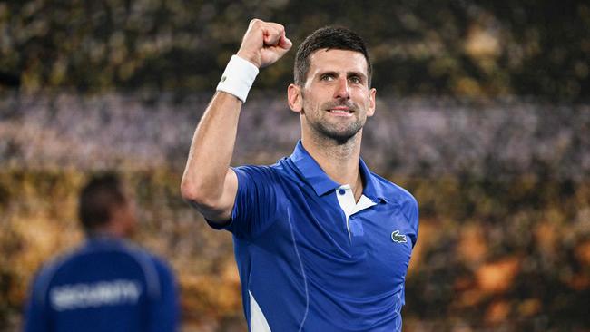 Novak Djokovic celebrates after victory against Argentina's Tomas Etcheverry. Picture: William West / AFP