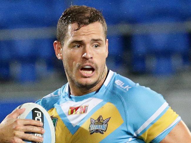 Aidan Sezer scores during the Round 3 NRL game between the Gold Coast Titans and the Newcastle Knights at CBus Super Stadium, Robina. Pics Adam Head