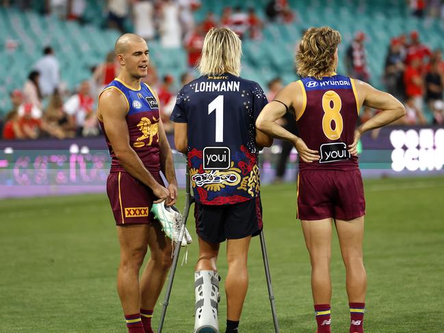 Brandon Starcevich, Kai Lohmann and Will Ashcoft after the Lions’ win on the SCG. Picture: Phil Hillyard