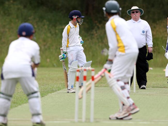 Calym Albany bowling during the under 11 junior cricket grand final between Tahmoor (batting) v Campbelltown Westerners at Jackson Park Woodbine. Picture: Jonathan Ng