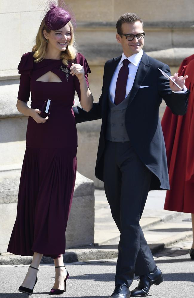 Macht and Barrett arrive at Windsor Castle for the royal wedding. (Toby Melville/pool photo via AP)