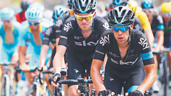 Tasmanian cycling star Richie Porte leads out Team Sky during stage 14 of the Tour de France, a 178km ride from Rodez to Mende. Porte was punched by a spectator with 3km to go in the stage while his teammate, race leader Chris Froome, had a cup of urine thrown over him as anti-Sky sentiment boiled over. Picture: GETTY