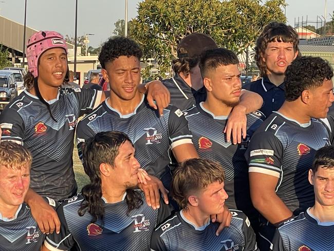 Redcliffe SHS players soak up the win.