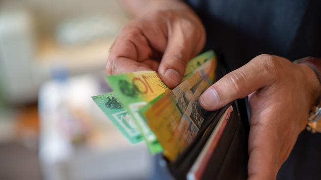 A woman from a wealthy south eastern suburb has been charged with raiding a pensioner’s wallet for cash. Picture: Generic