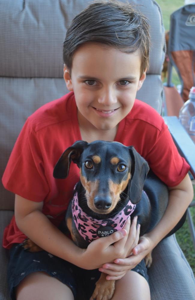 Matthew Zakal, 9, of Dolphin Heads, with Slinky at the Mackay Dachshunds Christmas Party. Photo: Janessa Ekert