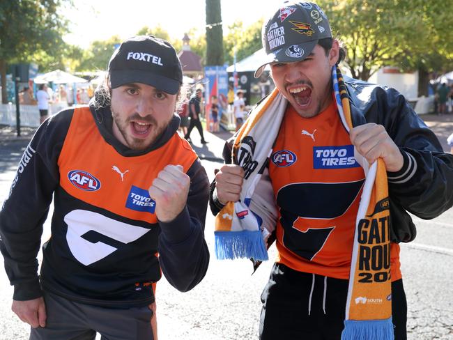 April 13, 2025: Super AFL fans James Kostarakis and Bruno Visentini at the Gather Round St Kilda v GWS Giants at Norwood Oval PicturePicture: Kelly Barnes