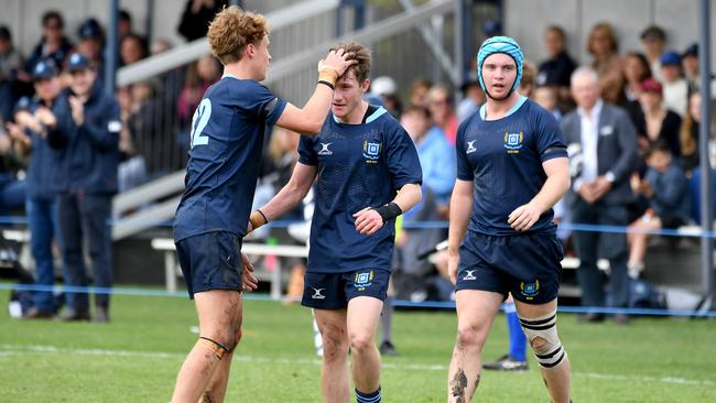 BGS player Lewis Strachan get congratulated by his team mates. . Picture, John Gass