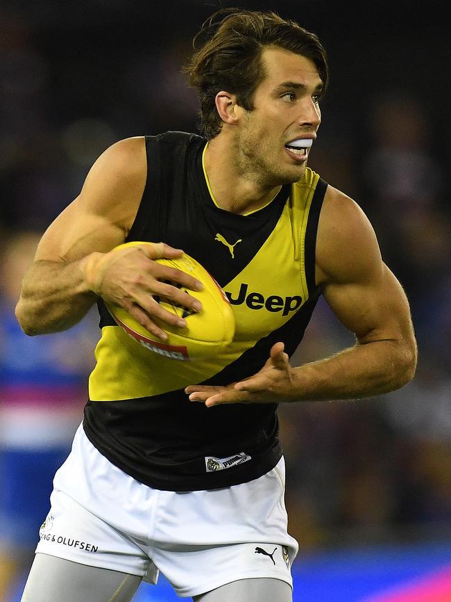 Alex Rance is selected at centre half-back.