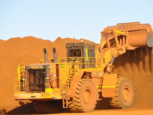 Stock image of Fortescue Metals Group's Christmas Creek iron ore operations in the Pilbara region of Western Australia, Tuesday, June 17, 2014. (AAP Image/Kim Christian) NO ARCHIVING