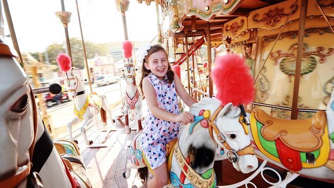 Ruby Templeton was one of the 20,000 people who enjoyed a spin on the new Double Decker Carousel. Picture: Sam Ruttyn