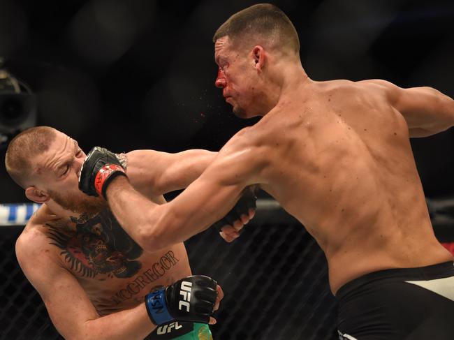 Las Vegas, CA - August 20:Conor McGregor, blue, defeats Nate Diaz via judges decision during UFC 202 at the T-Mobile Arena in Las Vegas, NV., Saturday, August 20, 2016. (Photo by Hans Gutknecht/MediaNews Group/Los Angeles Daily News via Getty Images)