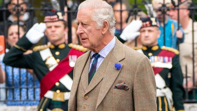 King Charles III at the gates of Balmoral as he takes up summer residence at the castle in Ballater. Picture: AFP.