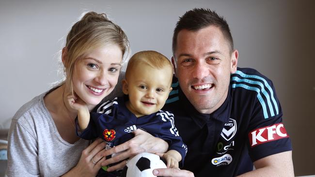 Danny Vukovic with wife Kristy and son Harley. Picture: David Caird
