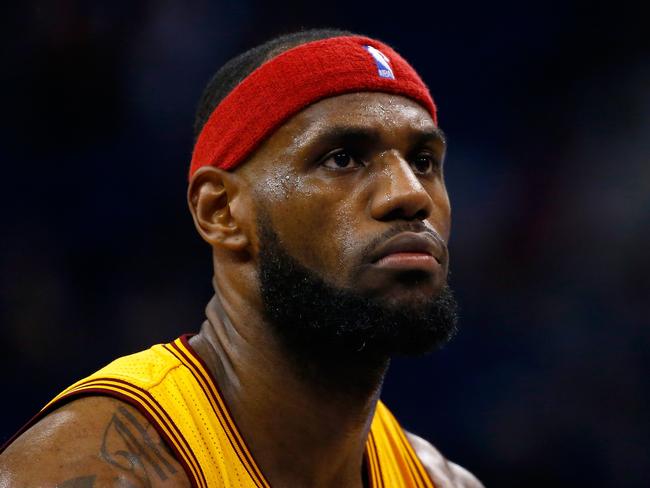 ORLANDO, FL - DECEMBER 26: Cleveland Cavaliers forward LeBron James #23 waits to attempt a foul shot during the game against the Orlando Magic at Amway Center on December 26, 2014 in Orlando, Florida. Sam Greenwood/Getty Images/AFP == FOR NEWSPAPERS, INTERNET, TELCOS & TELEVISION USE ONLY ==