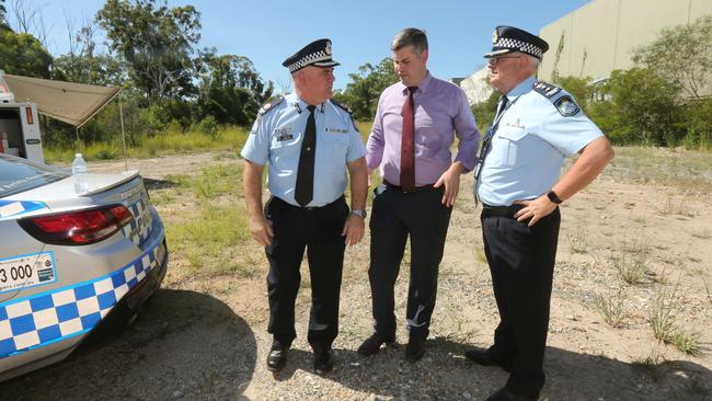 Police Minister Mark Ryan with, Assistant Commissioner Brian Codd and Chief superintendent Marty Mickelson (on right) and during a tour of a block of land in Arundel, concept plans for a new multipurpose police facility to serve as a hub by the end of 2019. Picture Mike Batterham