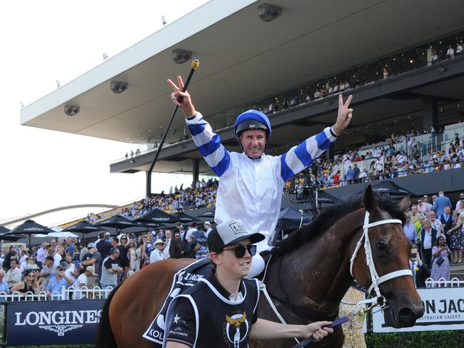 Jockey Glen Boss returns to scale after riding Kolding to victory in the Iron Jack Golden Eagle. Picture: AAP/Simon Bullard