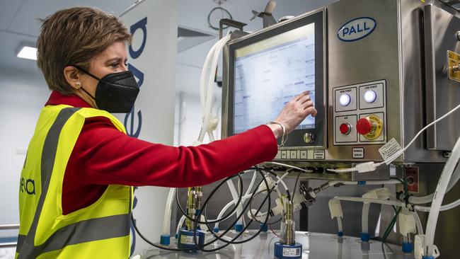 Scotland's First Minister Nicola Sturgeon operates on a cell expansion Bioreactor during a visit to the new Valvena Scotland vaccine manufacturing plant. Picture: Getty Images.