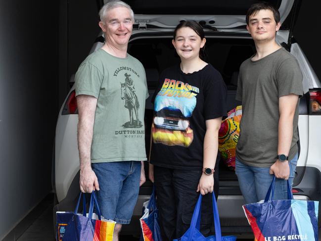 DAILY TELEGRAPH 8TH March SYDNEY AUSTRALIAThe Priestley family of Marsden Park - Mark with his children Emily, 17, and Ben ,15 with their weekly shopping.Picture: Brendan Read