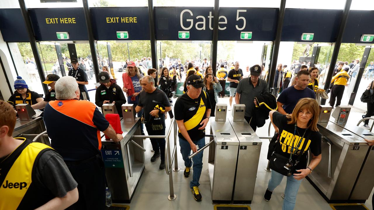 Fans enter the MCG. Picture: Michael Willson/AFL Photos via Getty Images