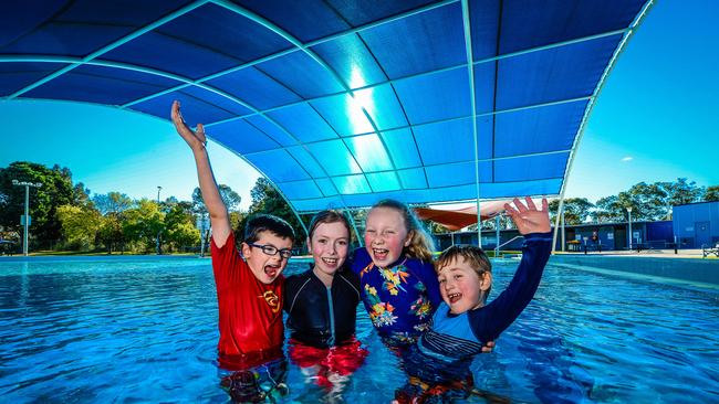 Cooper, 6, Ashlyn, 9, Bethany, 8, and James, 5, at Waterworld. Picture: Roy Vandervegt