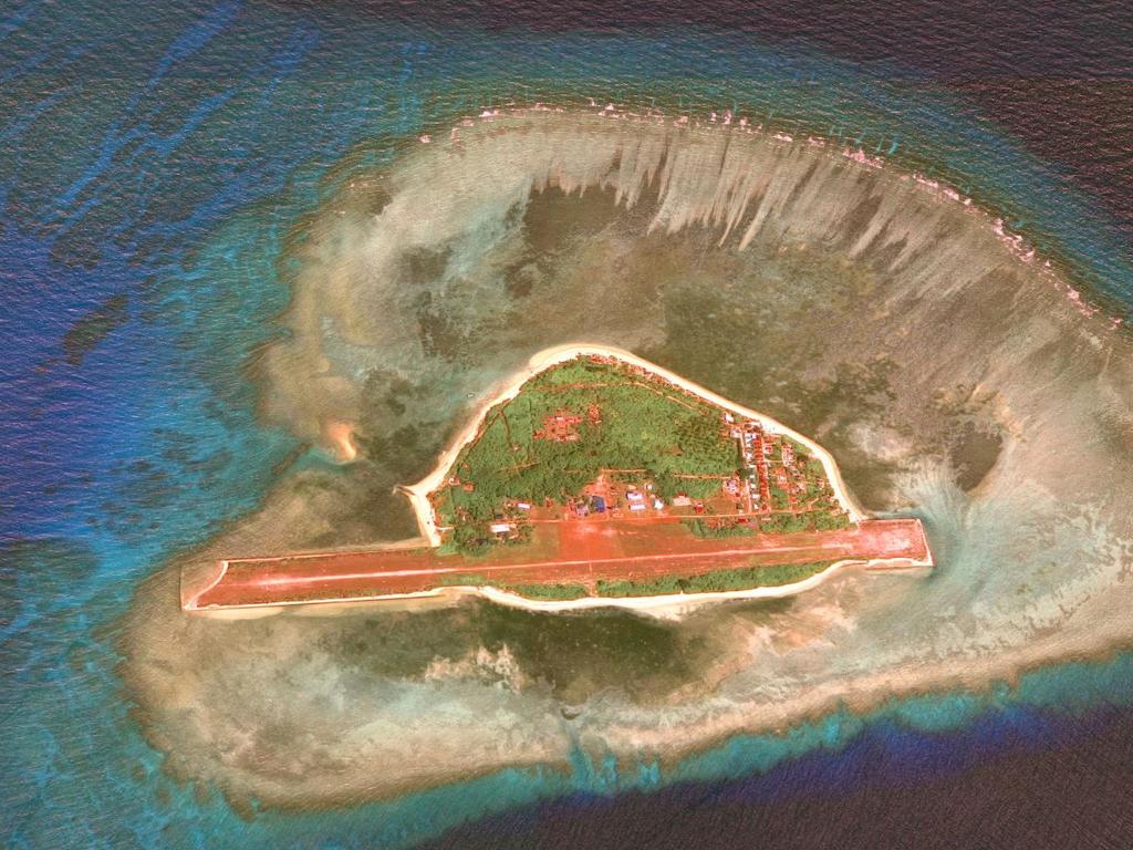 Thitu island. Efforts by the Philippines to upgrade its facilities here has been met by a swarm of 'militia' fishing boats sent by Beijing. Picture: Google Maps