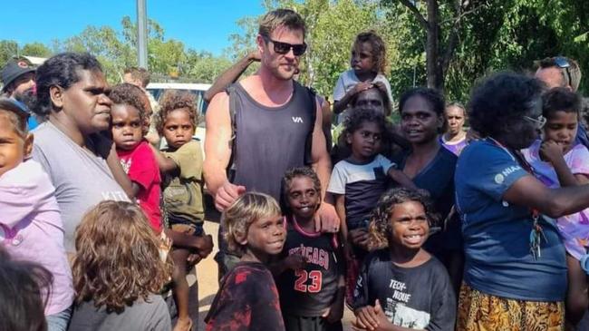 Thor megastar Chris Hemsworth with locals in Beswick, Northern Territory. Picture: Wugularr School