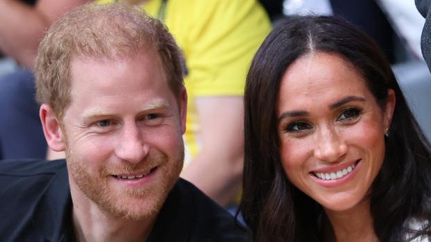 DUESSELDORF, GERMANY - SEPTEMBER 13: Prince Harry, Duke of Sussex and Meghan, Duchess of Sussex pose for a photograph as they attend the Wheelchair Basketball preliminary match between Ukraine and Australia during day four of the Invictus Games Düsseldorf 2023 on September 13, 2023 in Duesseldorf, Germany. (Photo by Chris Jackson/Getty Images for the Invictus Games Foundation)