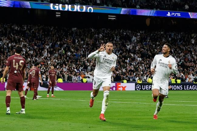 Real Madrid's Kylian Mbappe celebrates scoring his hat trick goal against Man City on Wednesday