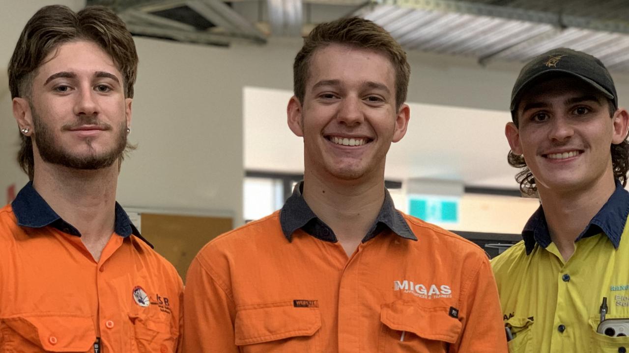 (From left to right) Apprentices Kade Starrett, Connor Dobson and Isaac Berardi at the Mackay CQU campus on April 14. Mr Starrett said EVs were more efficient than traditional combustion engines. Picture: Duncan Evans