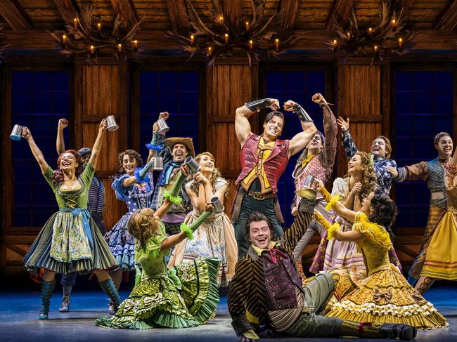 Tom Senior as Gaston and Louis Stockil as Le Fou lead the company in a previous production of Disney's Beauty and the Beast. Photo - Johan Persson